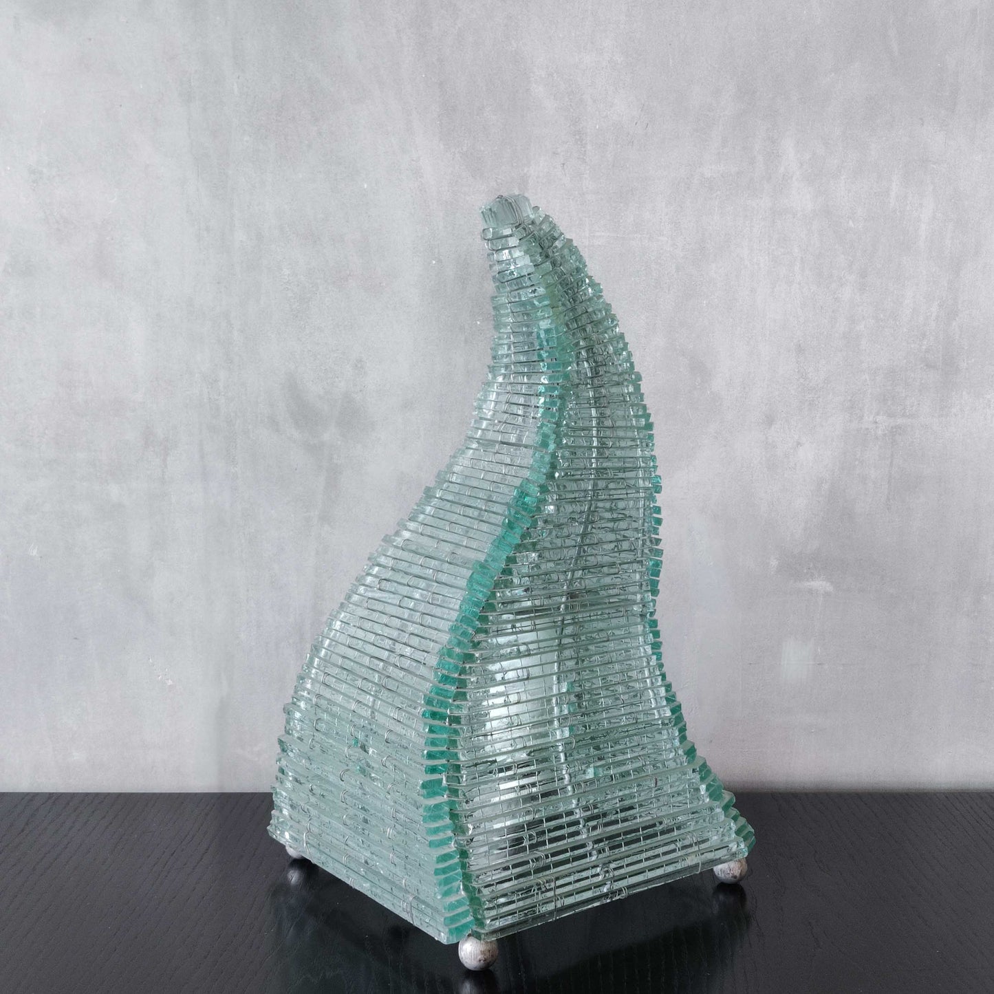 A 1970s stacked glass shard sculptural twisted pyramid lamp