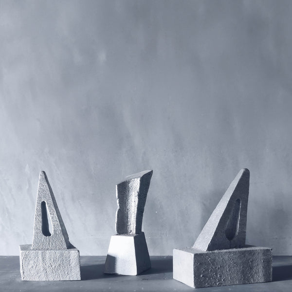 Trio of artist made abstract cast aluminium sculptures