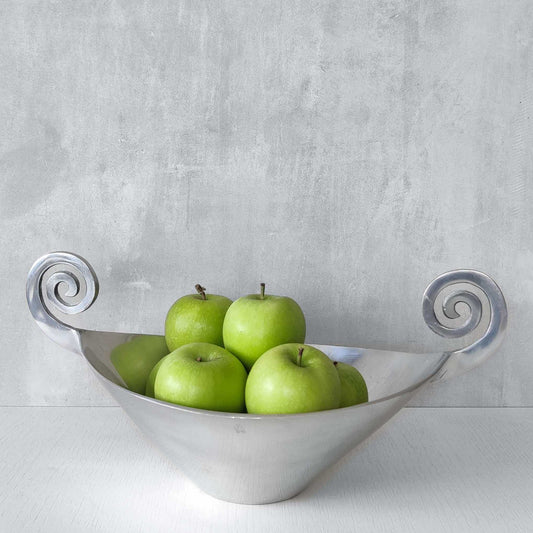 A 1990s cast aluminium centrepiece bowl with spiral handles