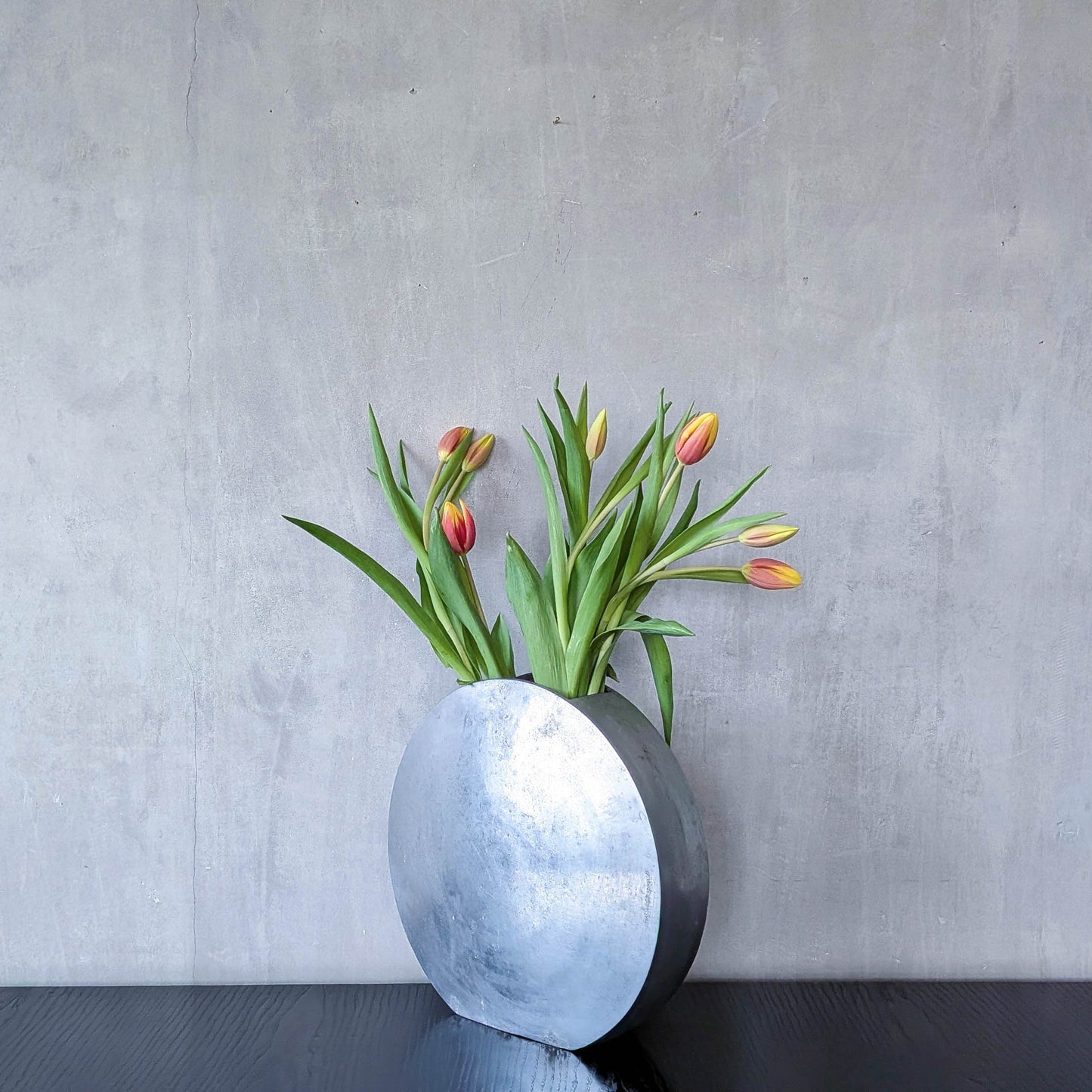 Vintage large sculptural round flat Art Deco style cast aluminium vase