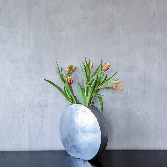 Vintage large sculptural round flat Art Deco style cast aluminium vase